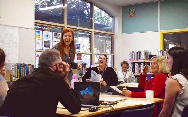 adrienne hornby laughing in school wellbeing presentation